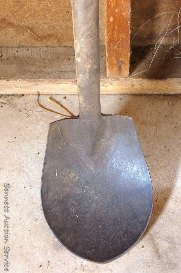 Specialty shovel for cleaning drains is 100" long, appears in good shape.