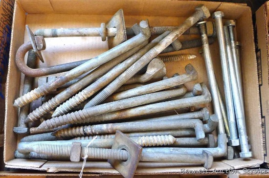 Assortment of telephone pole screw in steps, 10" long; 1/2" bolts and nuts, 9"; more.