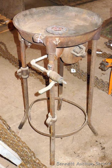 Cast iron blacksmith's forge is 18" diameter and stands 33" tall. Blower had been driven by a flat