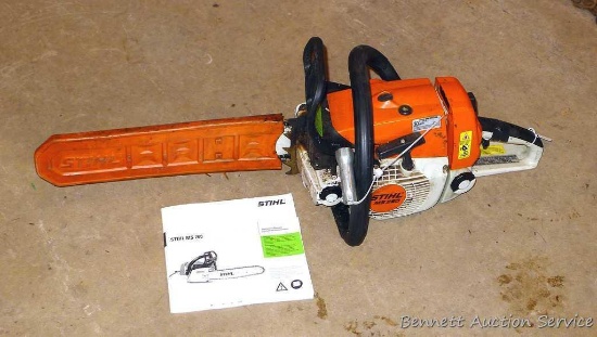 Stihl MS 260 chainsaw with 16" bar, bar cover, manual and wrench. Grip safety was wrapped with tape