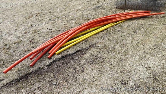 Pile of plastic gas pipe, most pieces approx. 16' long. Great for marking corner posts. Also