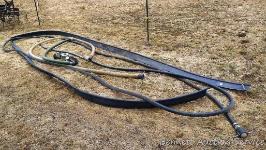 Around 60' of irrigation tube with a soaker section; approx. 20' and 7' suction hoses; small coil of