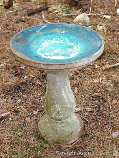Cast concrete bird bath is 26" high x 20" diameter. Two pieces for easier moving.