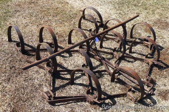 5' spring tooth harrow or drag. One tine is broken, one tine is missing, otherwise solid.