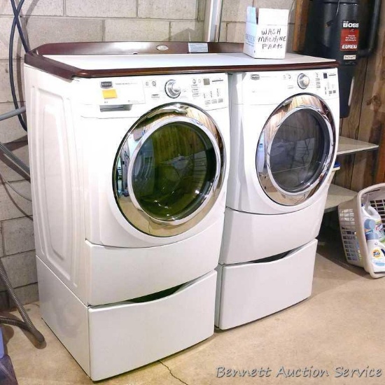 Maytag 5000 Series washer and dryer with storage bases and work top. Washer Model MHWE550WW01