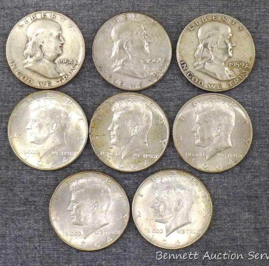 Eight silver half dollars including 1954-S