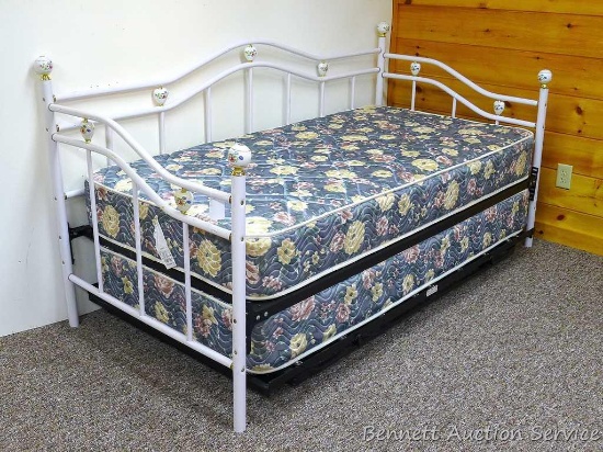 Nice trundle bed and mattresses with heart accent pieces. Approx. 77" l x 39" d x 40" h. Trundle