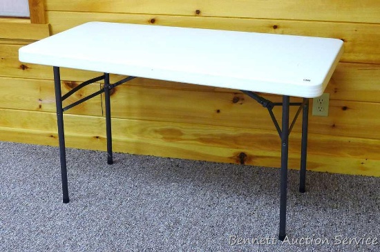 Nice folding table, 2' x 4'. Can be used for sewing table or more.