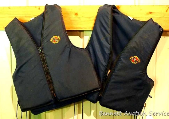 2 Stearns universal adult life jackets.
