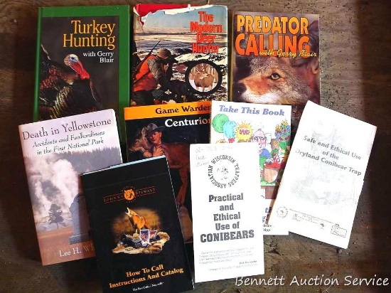 Assorted hunting books incl. Predator Calling, The Modern Deer Hunter, Death in Yellowstone and