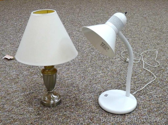 Two table lamps, one is adjustable. Approx. 18" high. Both work.