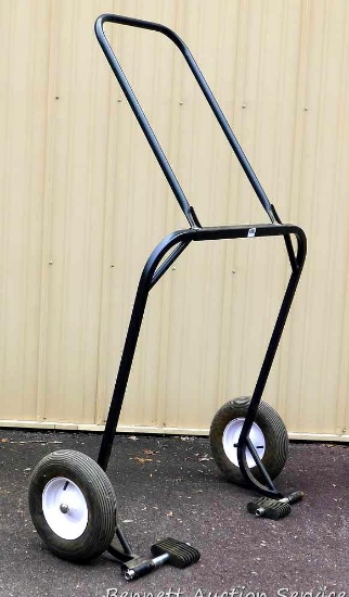 Very nice snowmobile dolly. Can move that heavy snowmobile with ease. Approx. 50" w x 8' l. Hardly