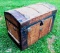 Antique Steamer Trunk: All original hardware, finish and color. Leather handles are missing. Has