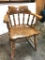 Chair: Wood arm chair, sturdy. 24