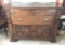 Buffet/Sideboard: Heavy antique quarter-sawn oak claw foot, 3 drawers, 2 doors, serpentine front