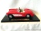 Model Car: 1957 Red Chevrolet Corvette Convertible, cast metal with plastic, model measures 9.5