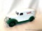 Model Car Bank: 1938 Chevy Panel Truck, green and white cast metal coin bank. East Krispy Kreme