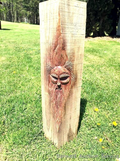 Wood carving: Old man winter type character carving on corner post. From "Wood Carvings by Bob