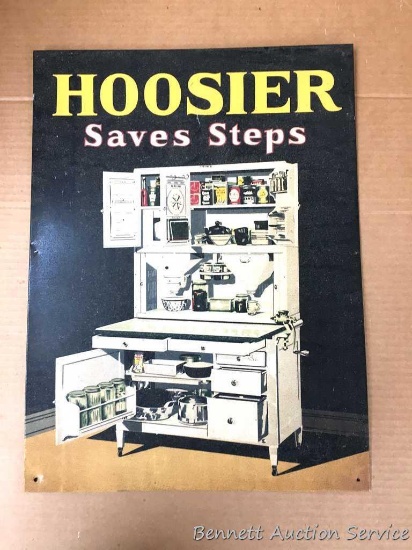Metal sign: Hoosier advertising "Hoosier Saves Steps." Scratch in the "S" of Hoosier. Metal finish