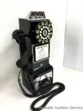 Reproduction Payphone: Modern, working, touch-tone phone with long cord. Looks like the old pay