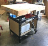 Work Bench: Includes power strip, storage bin, and trouble light with retractable reel, peg-board