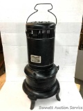Antique Kerosene Heater: Montgomery Ward kerosene heater. Clean. Some small rust on the back side of