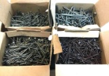 Nails: Four 5-pound boxes of nails, almost all full. 1 box of 16 penny, 2 boxes of 10 penny, 1 box