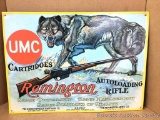 Metal sign: Remington Advertising, Metal with raised images of Wolf, rifle, Remington name, etc. UMC