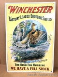 Metal sign: Winchester Factory Loaded Shotgun Shells advertising. 