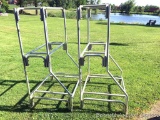 Aluminum Racks: Two aluminum racks, good for storing items. Each measuring 52
