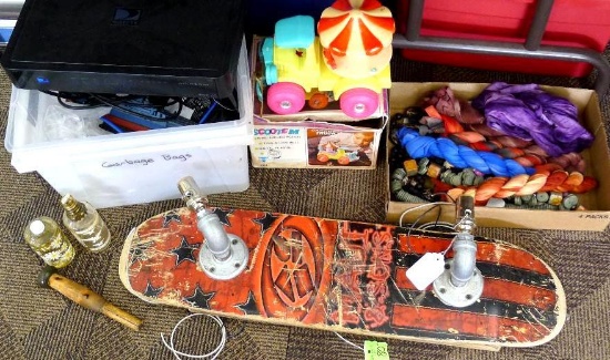Skateboard light, child's toy, beaded necklaces, scarves and more.
