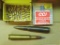 Military .50 BMG round, head stamped FA 38 CAL 50; reloaded .50 BMG round with silver tip bullet;