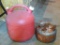 5 gallon Eagle gas tote is missing spout; 1 gallon steel gas can is in good condition.