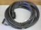 10 gauge 220 volt extension cord is approx. 25' long.