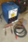 Miller Thunder Bolt AC welder with gloves, chipping hammers, assorted rod, more. Looks in good