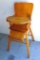 Antique high chair with adjustable foot rest. 17