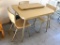 Vintage table with 3 matching chairs and one leaf. Table is 29-1/2