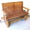 Wooden swing on a homemade stand. Swing is 51