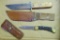 Buck No. 110X USA lock back knife with belt pouch, one handle slab has a tight crack and loose