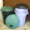 Three Rubbermaid garage cans with lids. Approx. 21-1/2
