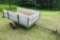 Two wheel metal framed trailer with wood sides and bottom. Approx. 7' x 4' x 17