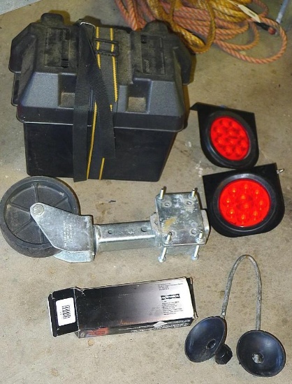 Marine battery case; fold down wheel for trailer tongue; two LED trailer lights; outboard motor