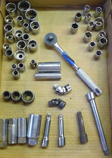 3/8" drive sockets, swivels, extensions, and ratchet. Sockets up to 1", down to 5/16", plus more.