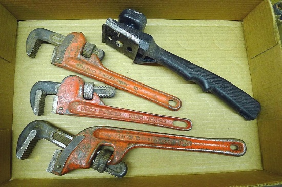 Ridgid 10" and 14" pipe wrenches, plus other 10" pipe wrench and a scraper. Jaws are in good shape.