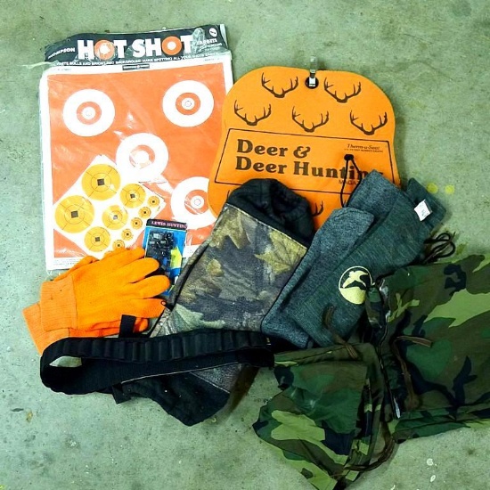Lots of targets, plus a foam hunting seat, camo hand warmer, cartridge belt, gloves, long gun socks,