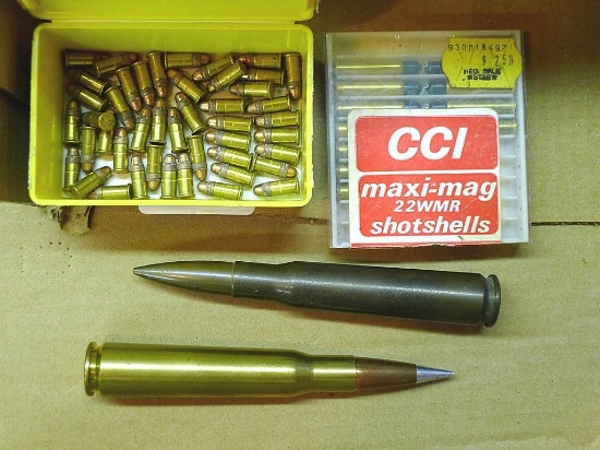 Military .50 BMG round, head stamped FA 38 CAL 50; reloaded .50 BMG round with silver tip bullet;