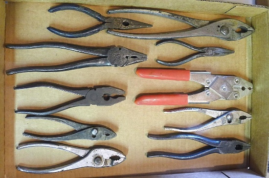Assorted pliers up to 10", plus a parallel jaw crimping tool.