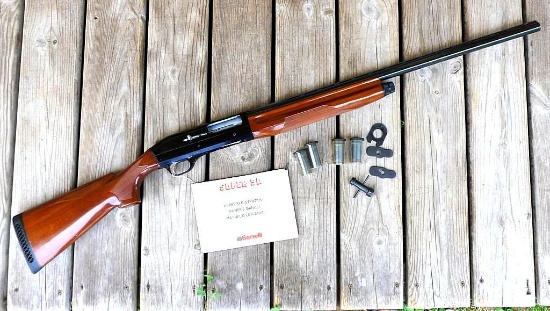 Benelli Montefeltro Super 90 semi-automatic 12 gauge Magnum shotgun with manual, five choke tubes,