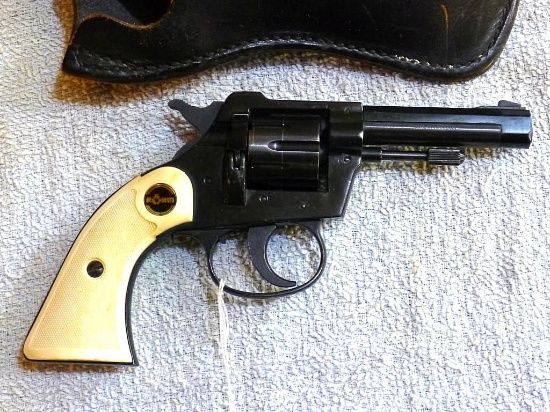 Rohm RG10S double action .22LR revolver with Bucheimer BPM-4 leather holster. Revolver is in very