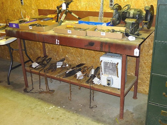 Well built metal workbench, 6 ft. long x 27" deep x 36" high. Has a backsplash. Please bring help on